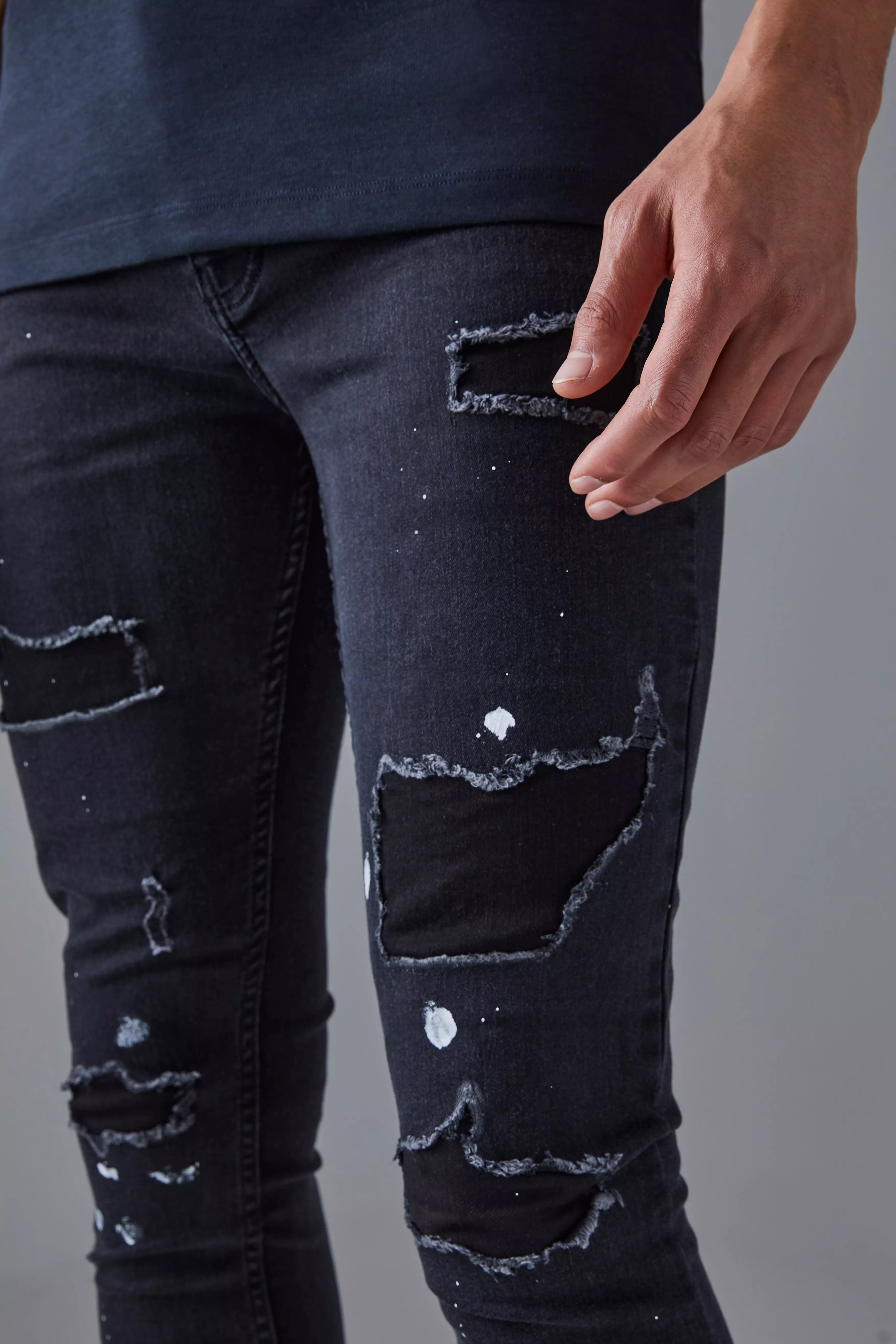 Mens ripped jeans hot sale with paint